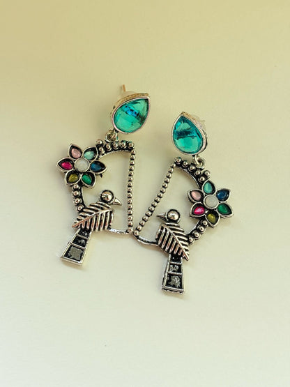 OXIDIZED PEACOCK FLORAL STATEMENT EARRINGS